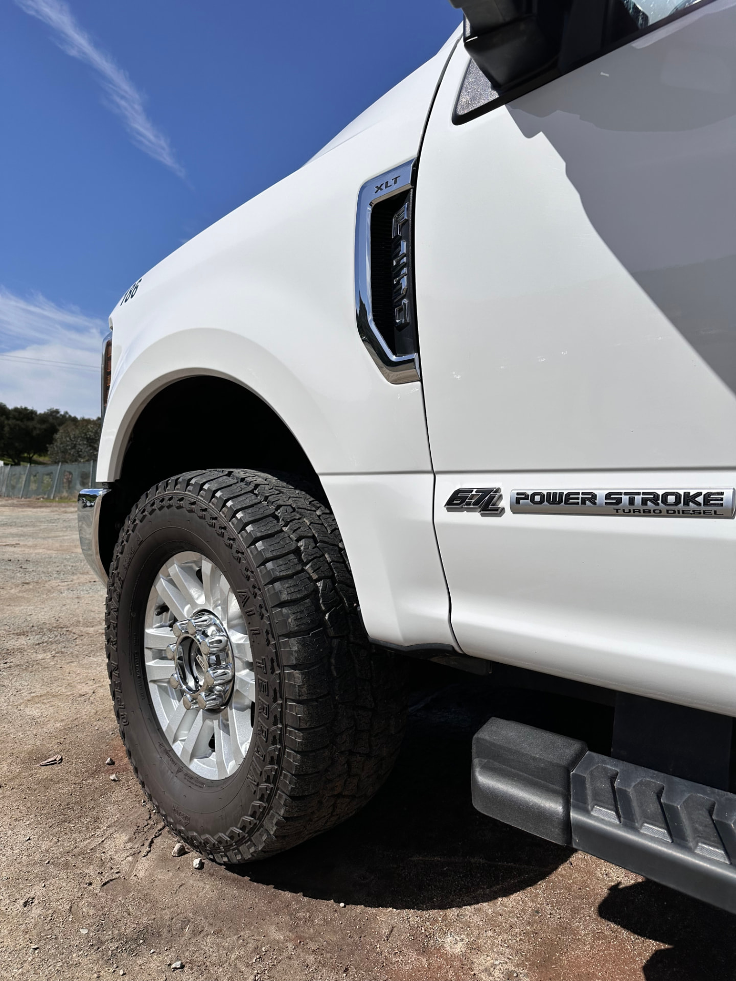 White Ford Super Duty truck after detailing